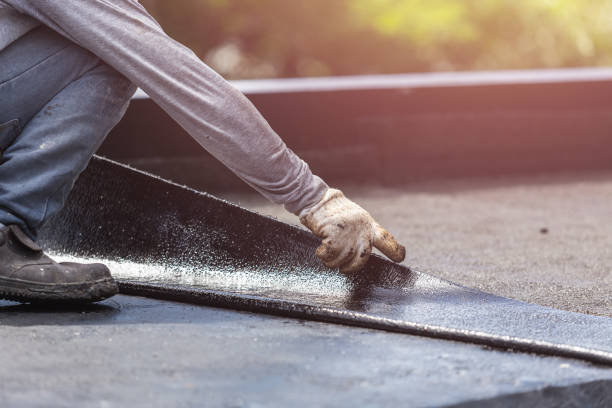 Professional Waterproofing technician working in New Hudson, MI